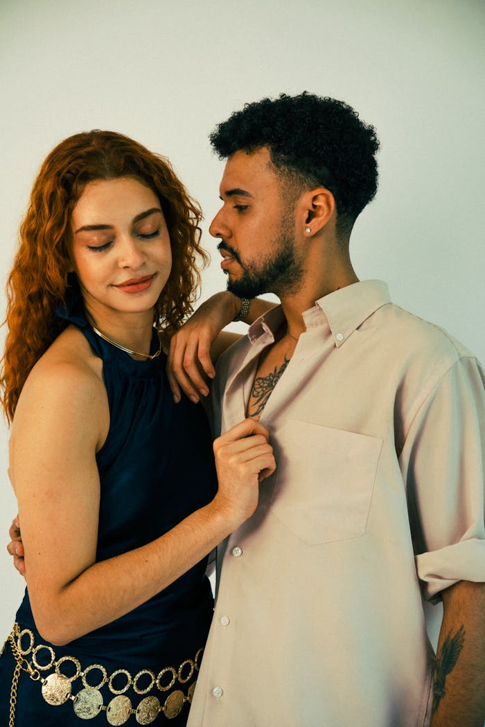 Stylish couple sharing an intimate moment, showcasing love and connection.
